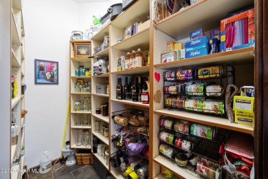 Discover an extraordinary 1.12-acre estate where luxury meets on Prescott Lakes Golf and Country Club in Arizona - for sale on GolfHomes.com, golf home, golf lot