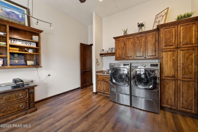 Discover an extraordinary 1.12-acre estate where luxury meets on Prescott Lakes Golf and Country Club in Arizona - for sale on GolfHomes.com, golf home, golf lot