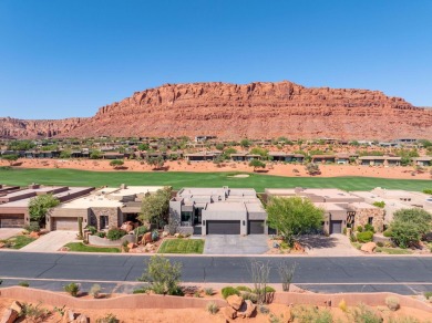 This spectacular home on the 6th Hole of the Entrada Golf Course on Entrada at Snow Canyon in Utah - for sale on GolfHomes.com, golf home, golf lot