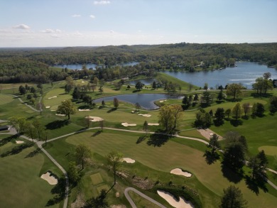 Unique Mid-Century Modern Home! This exceptional residence is a on Harrison Lake Country Club in Indiana - for sale on GolfHomes.com, golf home, golf lot