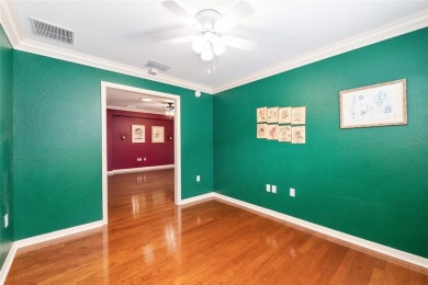 This popular Citation model is located in WINDWARD HILLS.   A on Eagle Ridge At Spruce Creek Country Club in Florida - for sale on GolfHomes.com, golf home, golf lot