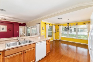 This popular Citation model is located in WINDWARD HILLS.   A on Eagle Ridge At Spruce Creek Country Club in Florida - for sale on GolfHomes.com, golf home, golf lot