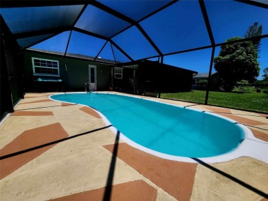 Pool home on Oakland Hills golf course in Rotonda West. There is on Rotonda Golf and Country Club The Hills Course in Florida - for sale on GolfHomes.com, golf home, golf lot