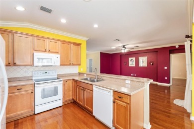 This popular Citation model is located in WINDWARD HILLS.   A on Eagle Ridge At Spruce Creek Country Club in Florida - for sale on GolfHomes.com, golf home, golf lot