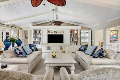 Experience refined lakefront living in this 3-bedroom, 2-bath on Quail Ridge Golf Course and Country Club in Florida - for sale on GolfHomes.com, golf home, golf lot