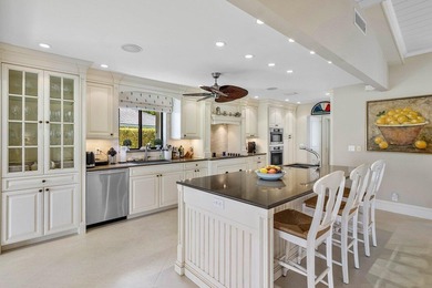 Experience refined lakefront living in this 3-bedroom, 2-bath on Quail Ridge Golf Course and Country Club in Florida - for sale on GolfHomes.com, golf home, golf lot