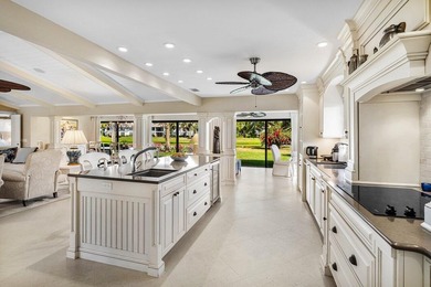 Experience refined lakefront living in this 3-bedroom, 2-bath on Quail Ridge Golf Course and Country Club in Florida - for sale on GolfHomes.com, golf home, golf lot