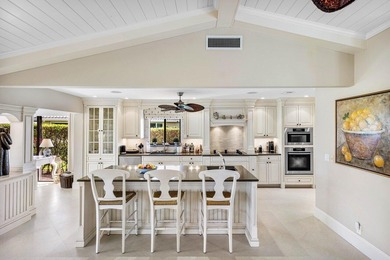 Experience refined lakefront living in this 3-bedroom, 2-bath on Quail Ridge Golf Course and Country Club in Florida - for sale on GolfHomes.com, golf home, golf lot