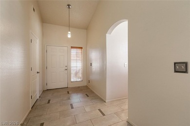 Check out the curb appeal on this FANTASTIC single story in on Painted Desert Golf Club in Nevada - for sale on GolfHomes.com, golf home, golf lot