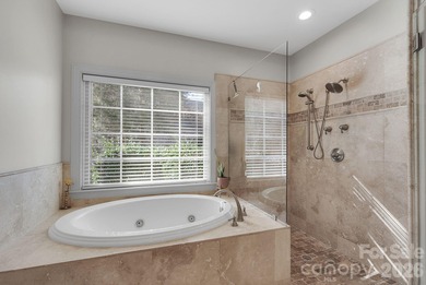 Welcome to this beautifully updated 5-bedroom, 4.5-bath custom on Cowans Ford Country Club in North Carolina - for sale on GolfHomes.com, golf home, golf lot