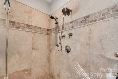 Welcome to this beautifully updated 5-bedroom, 4.5-bath custom on Cowans Ford Country Club in North Carolina - for sale on GolfHomes.com, golf home, golf lot