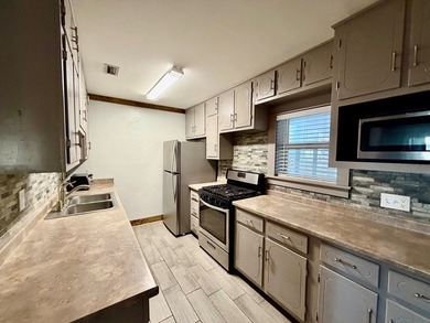 This charming home is located on a spacious 0.26-acre corner lot on  in Florida - for sale on GolfHomes.com, golf home, golf lot