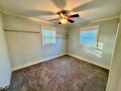 This charming home is located on a spacious 0.26-acre corner lot on  in Florida - for sale on GolfHomes.com, golf home, golf lot