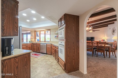 Beautifully maintained 4-bedroom, 2.5-bath home offering 2,572 on Arizona City Golf Club in Arizona - for sale on GolfHomes.com, golf home, golf lot