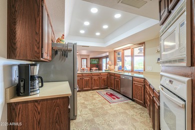 Beautifully maintained 4-bedroom, 2.5-bath home offering 2,572 on Arizona City Golf Club in Arizona - for sale on GolfHomes.com, golf home, golf lot