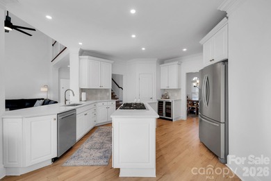 Welcome to this beautifully updated 5-bedroom, 4.5-bath custom on Cowans Ford Country Club in North Carolina - for sale on GolfHomes.com, golf home, golf lot