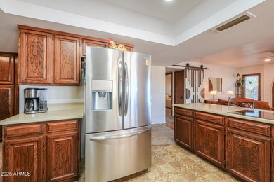 Beautifully maintained 4-bedroom, 2.5-bath home offering 2,572 on Arizona City Golf Club in Arizona - for sale on GolfHomes.com, golf home, golf lot