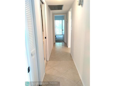 HANDYMAN SPECIAL. QUIET LOCATION CLOSE TO LYONS RD ENTRANCE on Wynmoor Golf Course in Florida - for sale on GolfHomes.com, golf home, golf lot