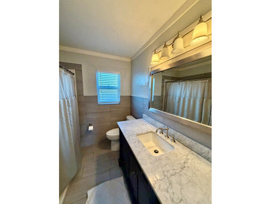 This charming home is located on a spacious 0.26-acre corner lot on  in Florida - for sale on GolfHomes.com, golf home, golf lot