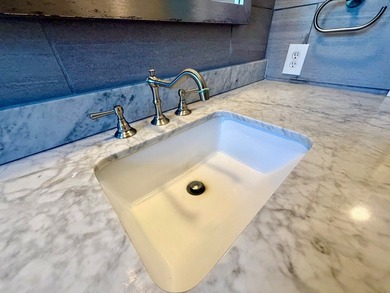 This charming home is located on a spacious 0.26-acre corner lot on  in Florida - for sale on GolfHomes.com, golf home, golf lot