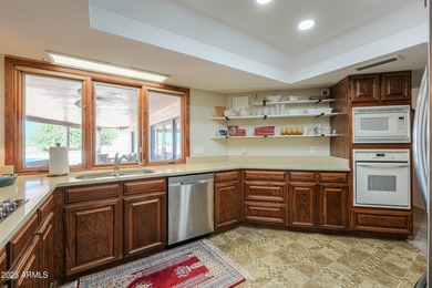 Beautifully maintained 4-bedroom, 2.5-bath home offering 2,572 on Arizona City Golf Club in Arizona - for sale on GolfHomes.com, golf home, golf lot