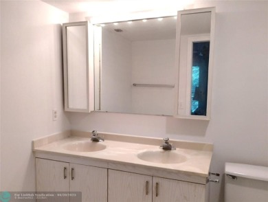 HANDYMAN SPECIAL. QUIET LOCATION CLOSE TO LYONS RD ENTRANCE on Wynmoor Golf Course in Florida - for sale on GolfHomes.com, golf home, golf lot
