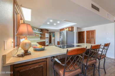 Beautifully maintained 4-bedroom, 2.5-bath home offering 2,572 on Arizona City Golf Club in Arizona - for sale on GolfHomes.com, golf home, golf lot