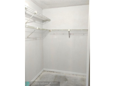 HANDYMAN SPECIAL. QUIET LOCATION CLOSE TO LYONS RD ENTRANCE on Wynmoor Golf Course in Florida - for sale on GolfHomes.com, golf home, golf lot