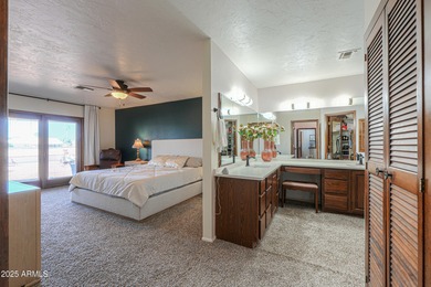 Beautifully maintained 4-bedroom, 2.5-bath home offering 2,572 on Arizona City Golf Club in Arizona - for sale on GolfHomes.com, golf home, golf lot