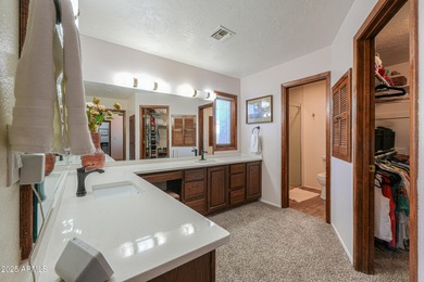 Beautifully maintained 4-bedroom, 2.5-bath home offering 2,572 on Arizona City Golf Club in Arizona - for sale on GolfHomes.com, golf home, golf lot