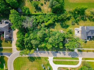 Seize the opportunity to build your dream home on this on West Shore Golf and Country Club in Michigan - for sale on GolfHomes.com, golf home, golf lot