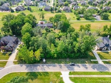 Seize the opportunity to build your dream home on this on West Shore Golf and Country Club in Michigan - for sale on GolfHomes.com, golf home, golf lot