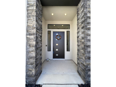 1325 Pocket Mesa Dr - Modern Desert Living at The Ledges. This on The Ledges Golf Club in Utah - for sale on GolfHomes.com, golf home, golf lot