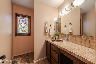 Beautifully maintained 4-bedroom, 2.5-bath home offering 2,572 on Arizona City Golf Club in Arizona - for sale on GolfHomes.com, golf home, golf lot