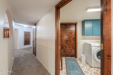 Beautifully maintained 4-bedroom, 2.5-bath home offering 2,572 on Arizona City Golf Club in Arizona - for sale on GolfHomes.com, golf home, golf lot