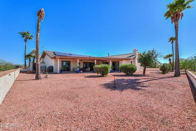 Beautifully maintained 4-bedroom, 2.5-bath home offering 2,572 on Arizona City Golf Club in Arizona - for sale on GolfHomes.com, golf home, golf lot