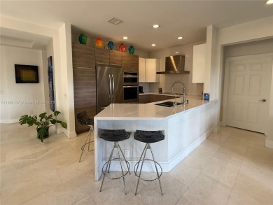 Welcome to this elegant first-floor condominium at The Legends on Weston Hills Country Club in Florida - for sale on GolfHomes.com, golf home, golf lot