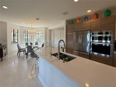 Welcome to this elegant first-floor condominium at The Legends on Weston Hills Country Club in Florida - for sale on GolfHomes.com, golf home, golf lot