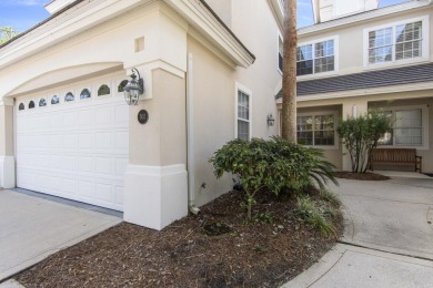 Experience luxury living in this desirable ground-floor Golf on Regatta Bay Golf and Country Club in Florida - for sale on GolfHomes.com, golf home, golf lot