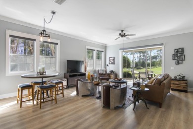 Experience luxury living in this desirable ground-floor Golf on Regatta Bay Golf and Country Club in Florida - for sale on GolfHomes.com, golf home, golf lot