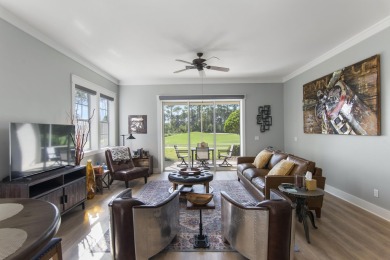 Experience luxury living in this desirable ground-floor Golf on Regatta Bay Golf and Country Club in Florida - for sale on GolfHomes.com, golf home, golf lot