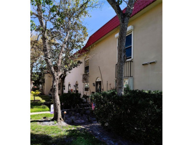 PRICE IMPROVEMENT!!!!You will love this spacious end unit on The Dunedin Country Club in Florida - for sale on GolfHomes.com, golf home, golf lot