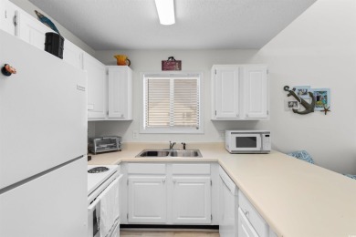 Welcome to this delightful 2-bedroom, 2-bathroom condo in the on Heron Point Golf Club in South Carolina - for sale on GolfHomes.com, golf home, golf lot
