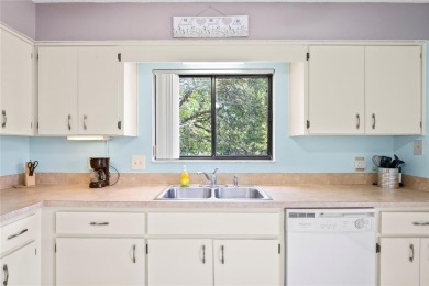 I invite you start your day with a morning coffee on the kitchen on Beacon Woods Golf Club in Florida - for sale on GolfHomes.com, golf home, golf lot