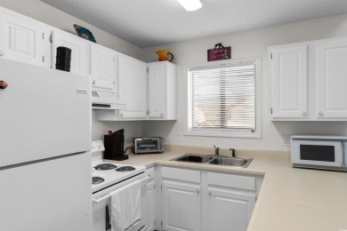 Welcome to this delightful 2-bedroom, 2-bathroom condo in the on Heron Point Golf Club in South Carolina - for sale on GolfHomes.com, golf home, golf lot