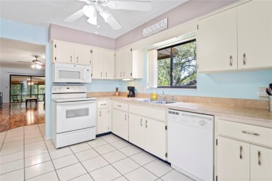 I invite you start your day with a morning coffee on the kitchen on Beacon Woods Golf Club in Florida - for sale on GolfHomes.com, golf home, golf lot