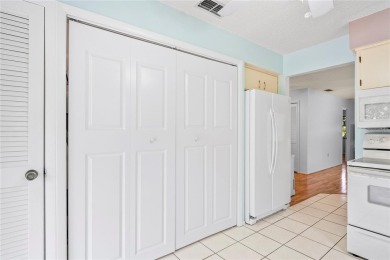I invite you start your day with a morning coffee on the kitchen on Beacon Woods Golf Club in Florida - for sale on GolfHomes.com, golf home, golf lot