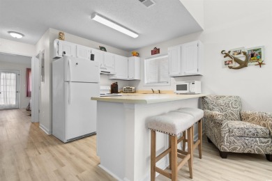 Welcome to this delightful 2-bedroom, 2-bathroom condo in the on Heron Point Golf Club in South Carolina - for sale on GolfHomes.com, golf home, golf lot
