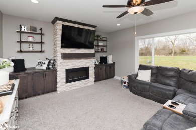 SHOW STOPPER!! Welcome to 1150 Cardinal Drive, a beautifully on Tournament Club of Iowa in Iowa - for sale on GolfHomes.com, golf home, golf lot