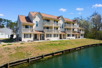 Welcome to this delightful 2-bedroom, 2-bathroom condo in the on Heron Point Golf Club in South Carolina - for sale on GolfHomes.com, golf home, golf lot